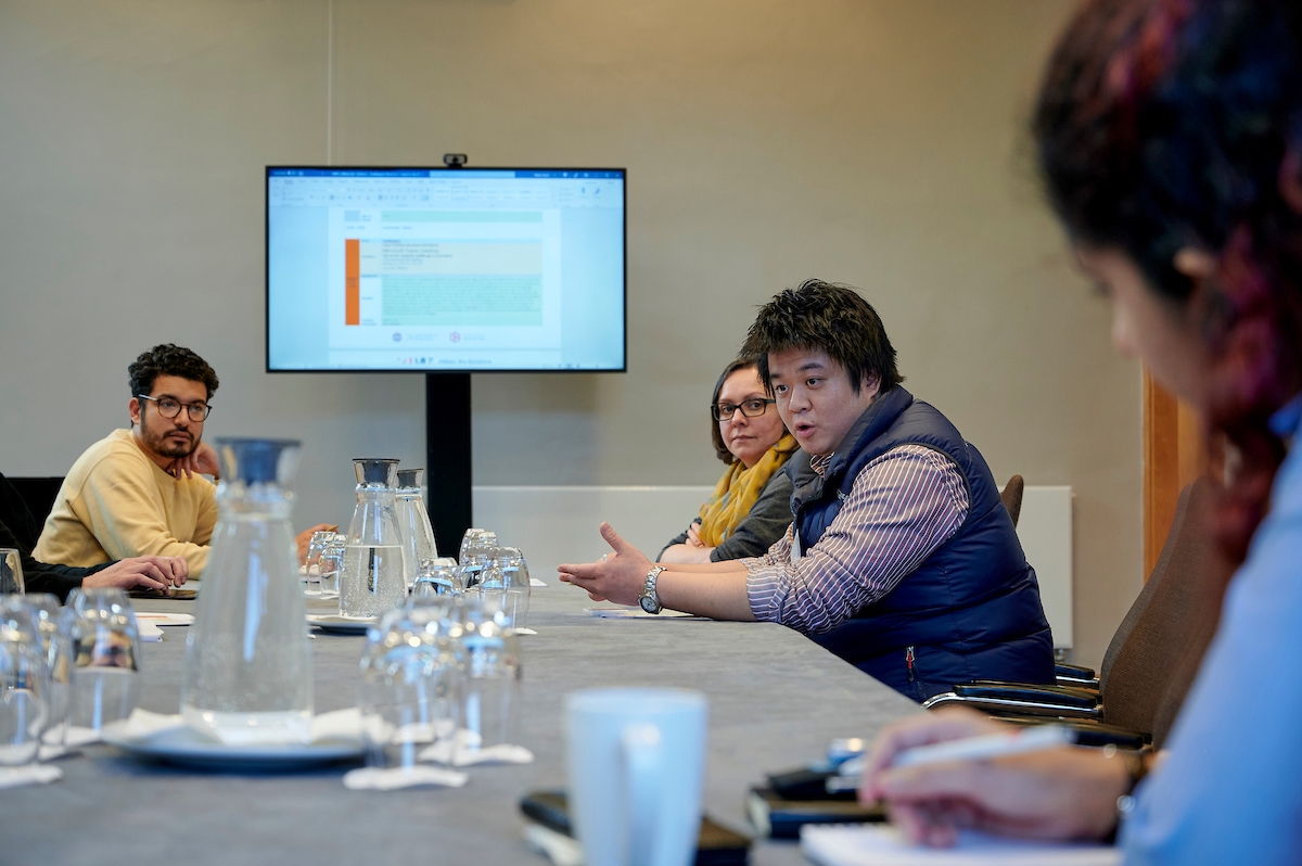 Impact Solutions' Idriss Elkettani (left) and Dr Galvin Leung (right) with the University's Professor Louise Horsfall