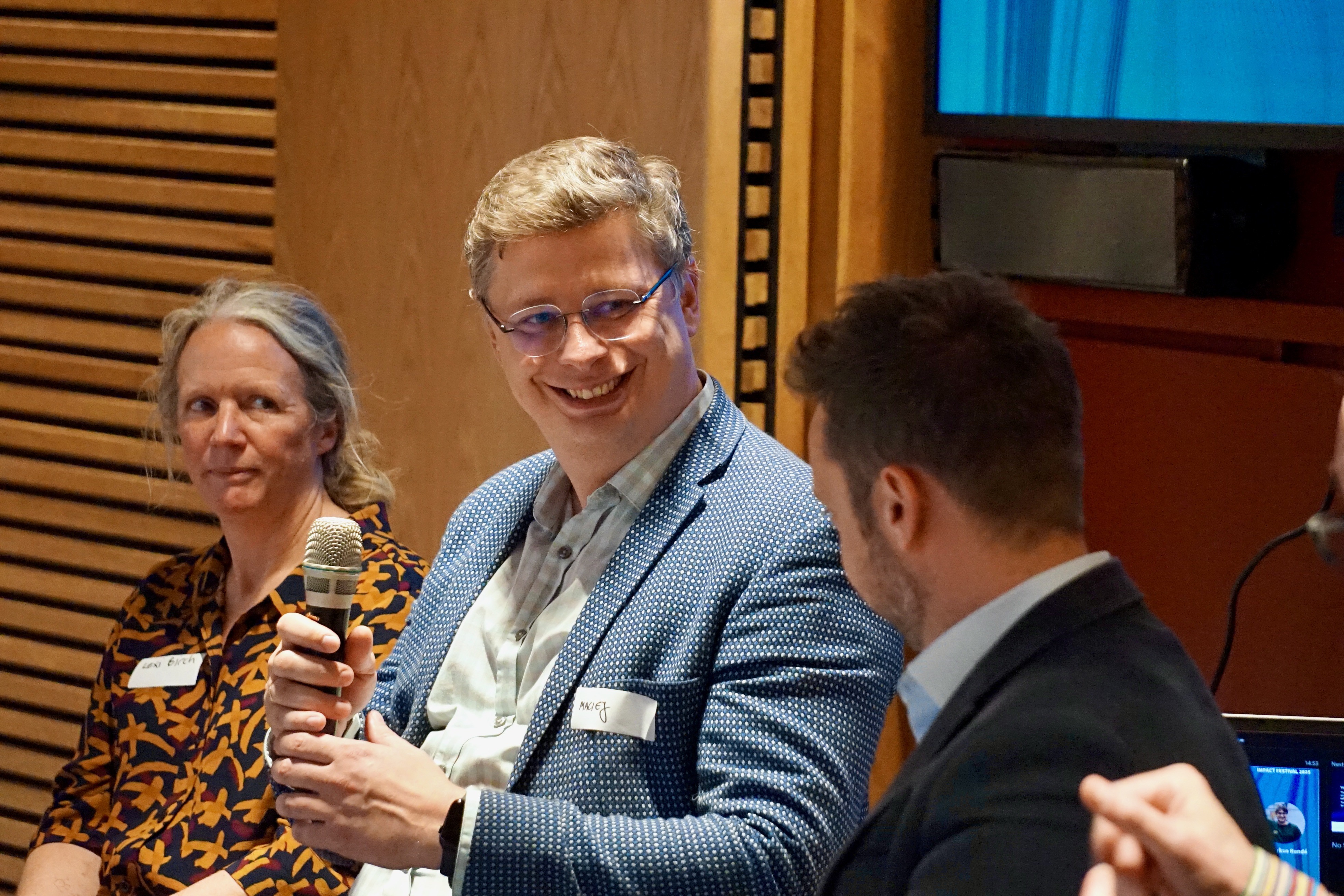 Dr Maciej Parys with Dr Lexi Birch and Ian Hatch during EI's fireside chat