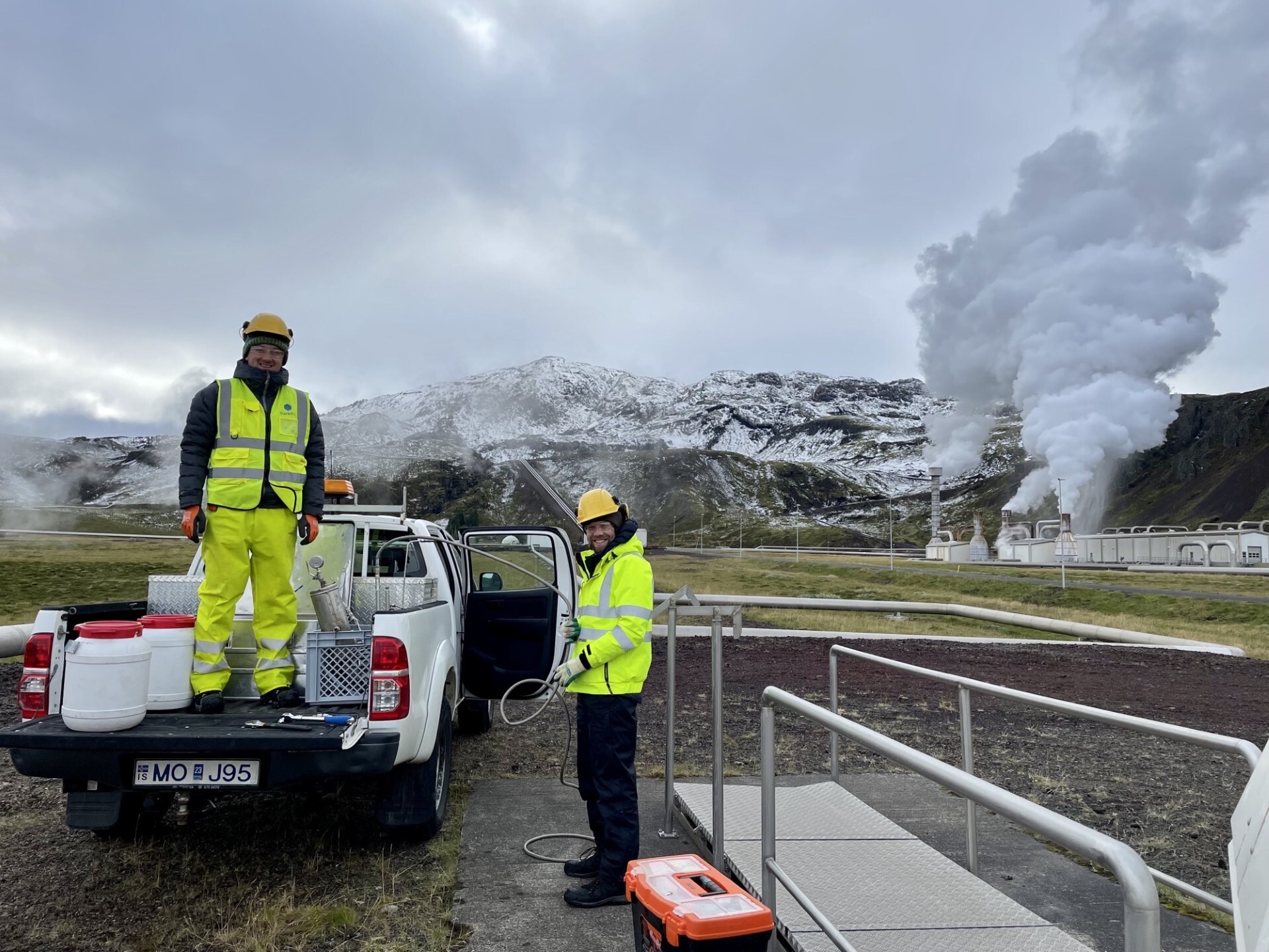 L-R Dr Chris Holdsworth and Prof Stuart Gilfillan collecting samples at a Carbfix site at Nesjavellir geothermal power plant in Iceland