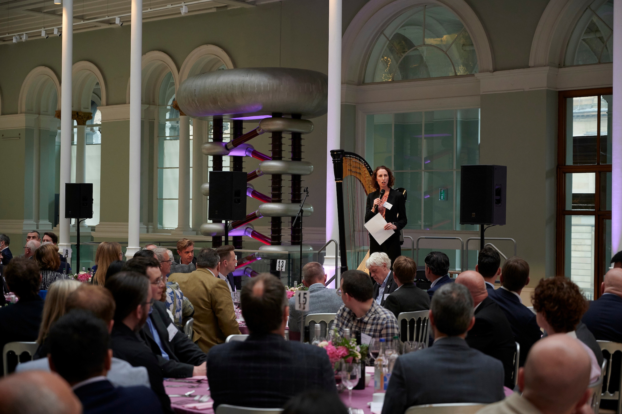 Dr Andrea Taylor on stage at the National Museum of Scotland