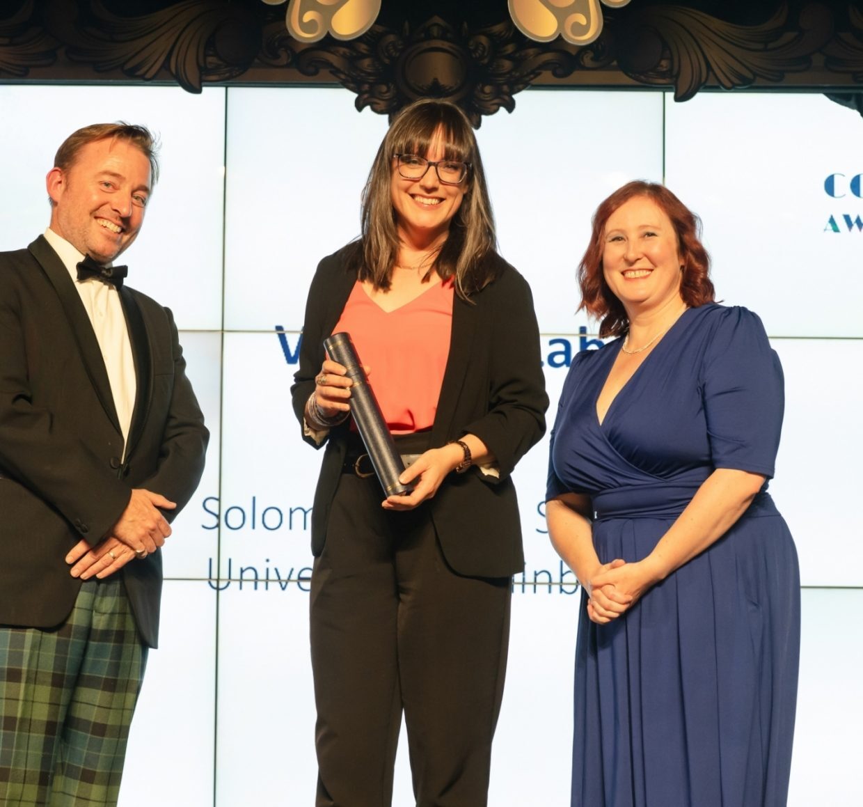 Edinburgh Innovations' Lizzie Withington accepts The Ventures Lab Award on behalf of Solomon White of Seasat
